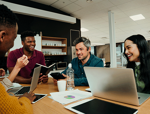 Group of coworkers collaborating in a meeting - SMMes