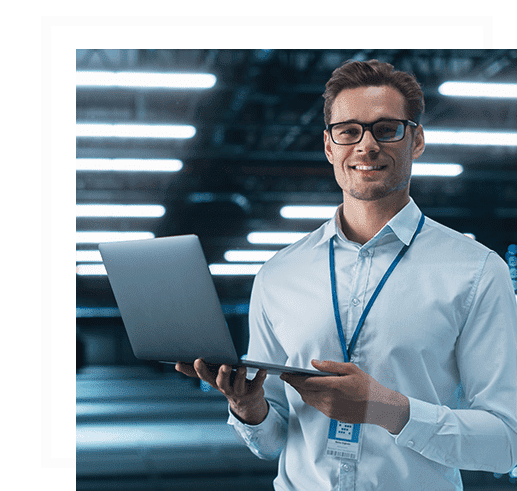 Microsoft Azure - Man holding laptop in a data center