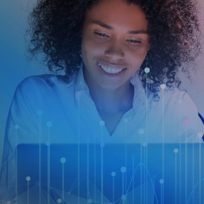 SMMEs Sation – Woman smiling using laptop SMMEs Sation - Woman smiling using laptop