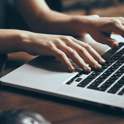 Teams Teams - Person typing on laptop keyboard