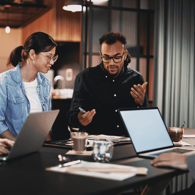 featured-image Man and woman collaborating in a meeting